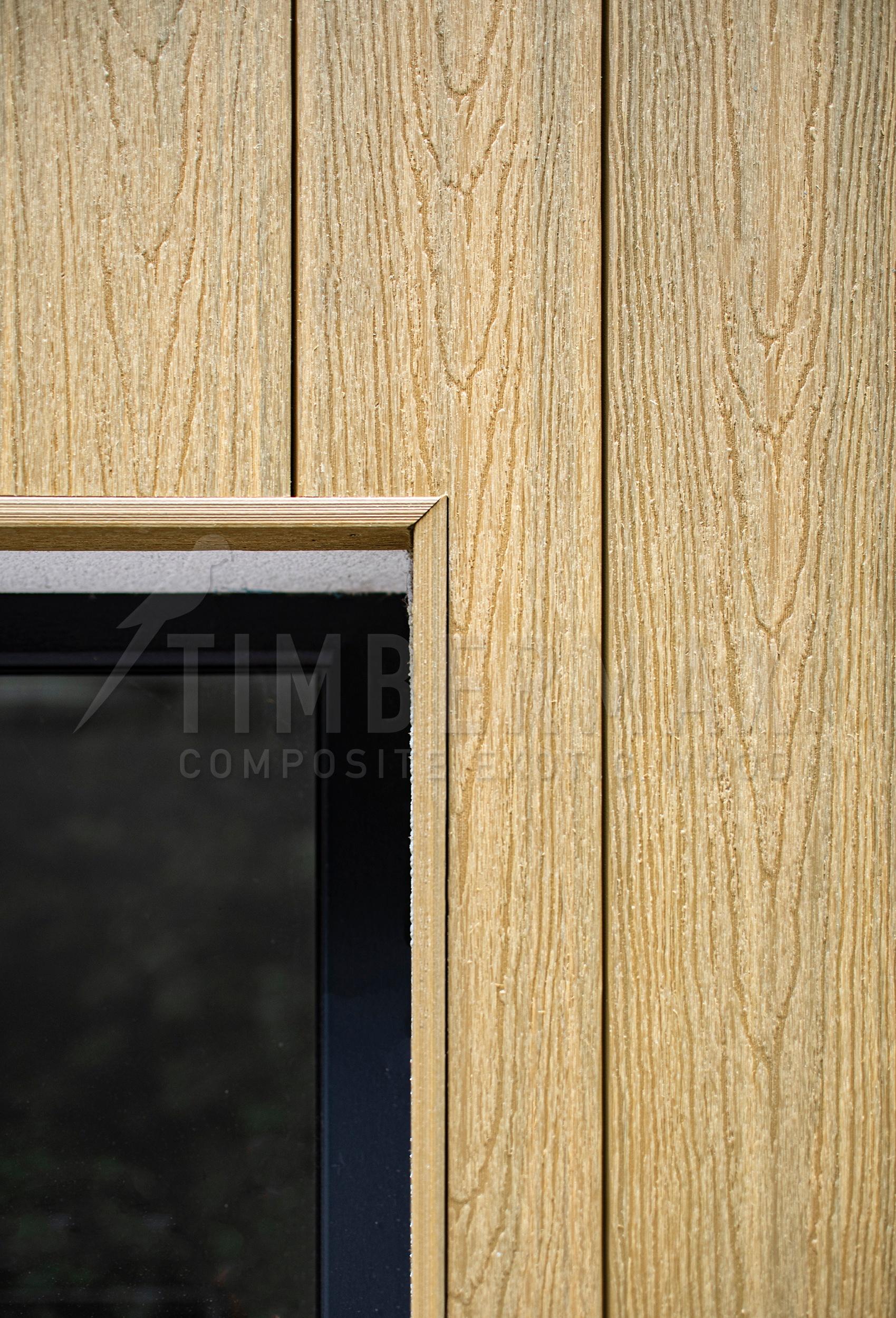 detail of light facade cladding natural wood look from composite boards
