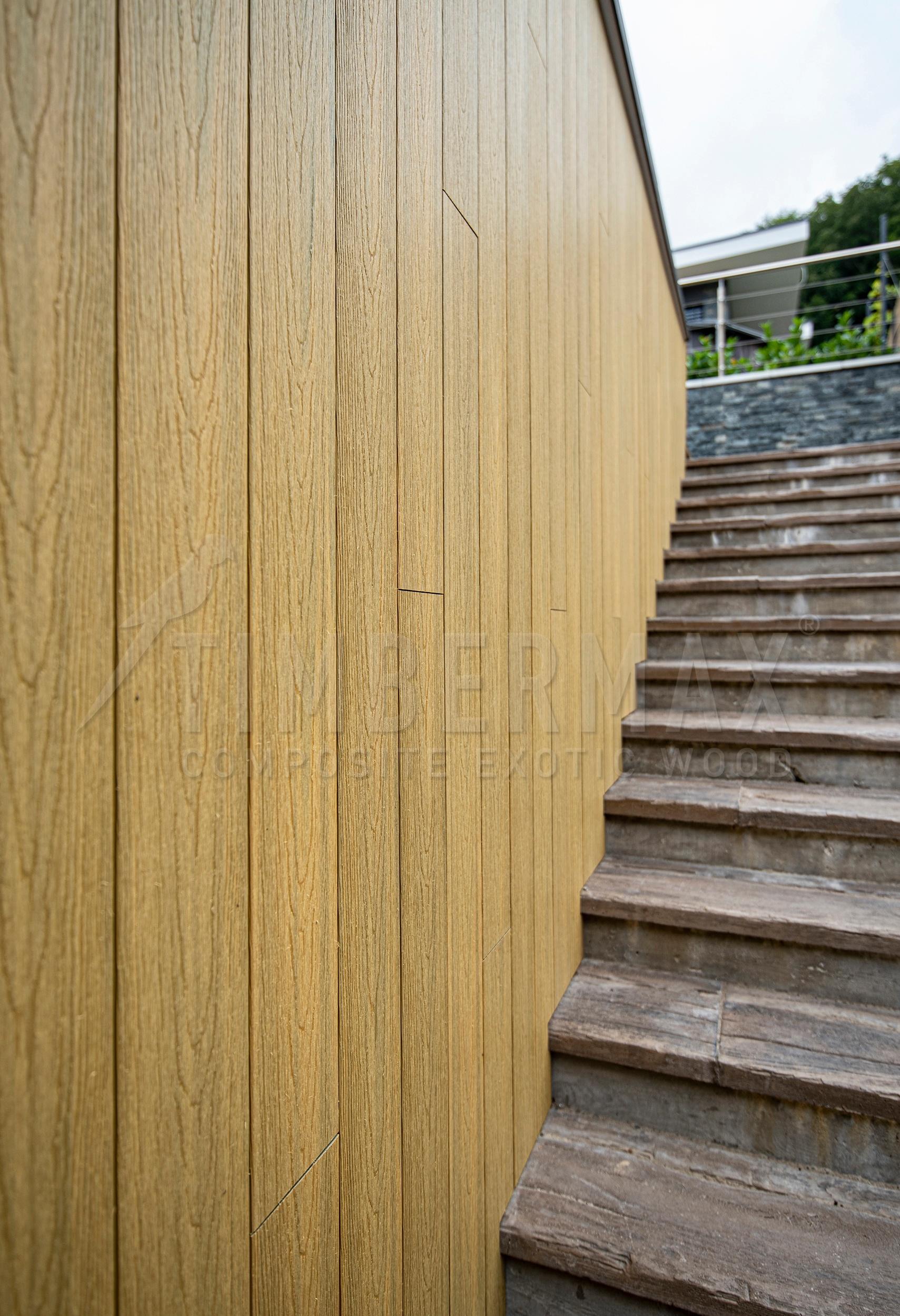 ventilated facade with imitation wood cladding on a modern building
