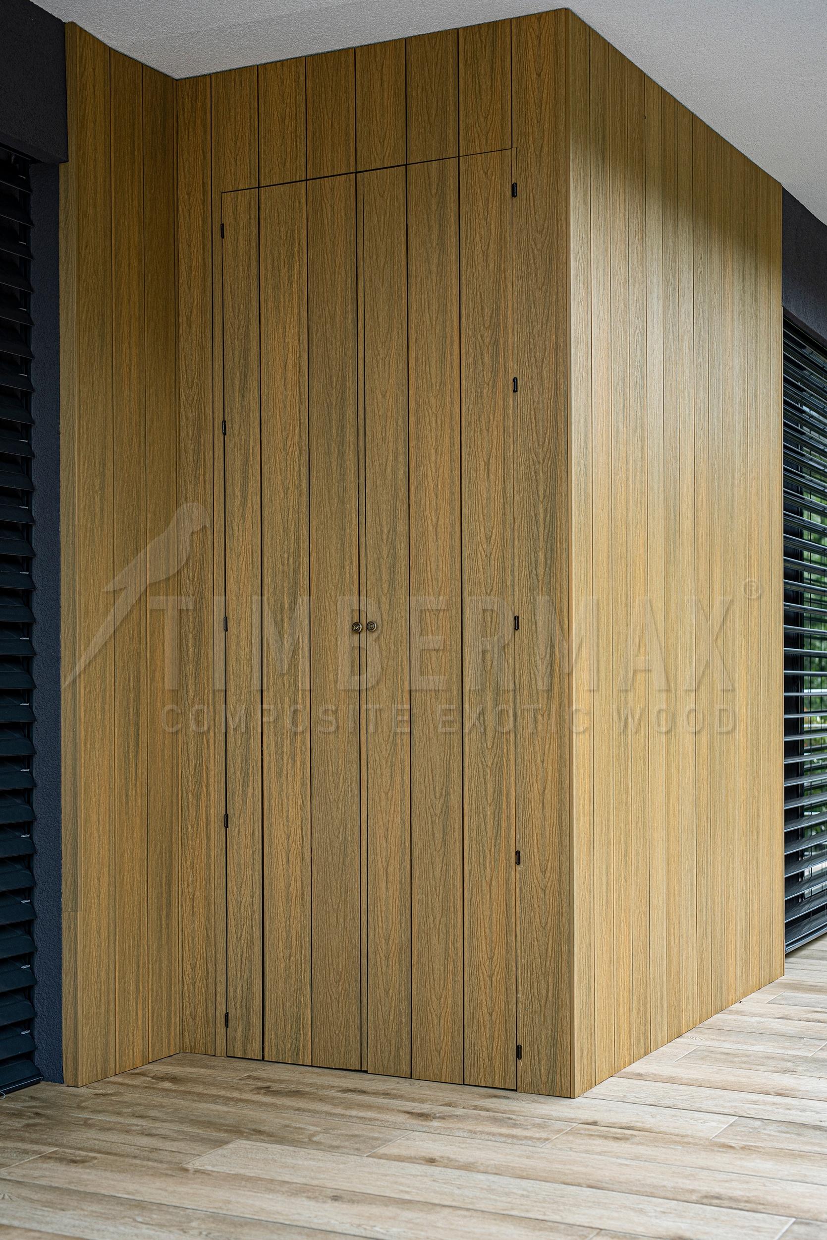 facade coverings imitating wood on the modern facade of the house