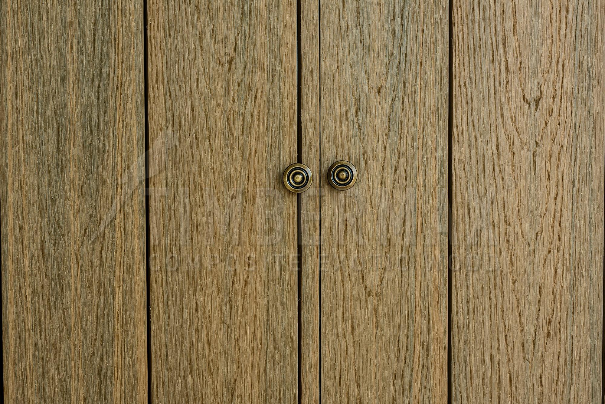 detail of the facade cladding, wood-look from composite panels for the facade