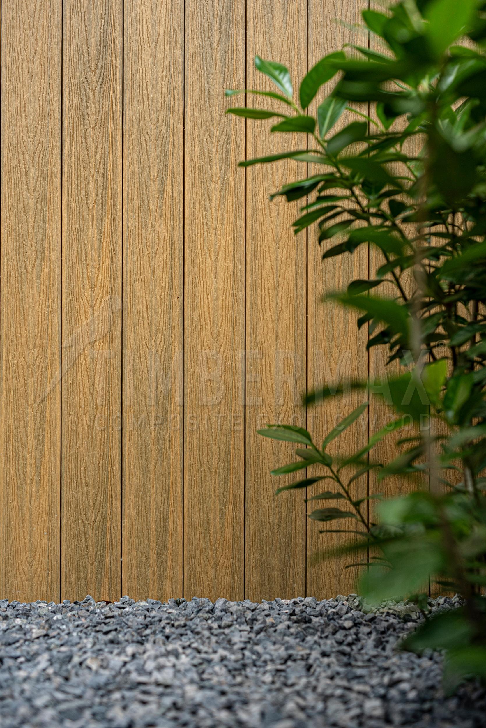 detail of the facade cladding, wood-look from composite panels for the facade
