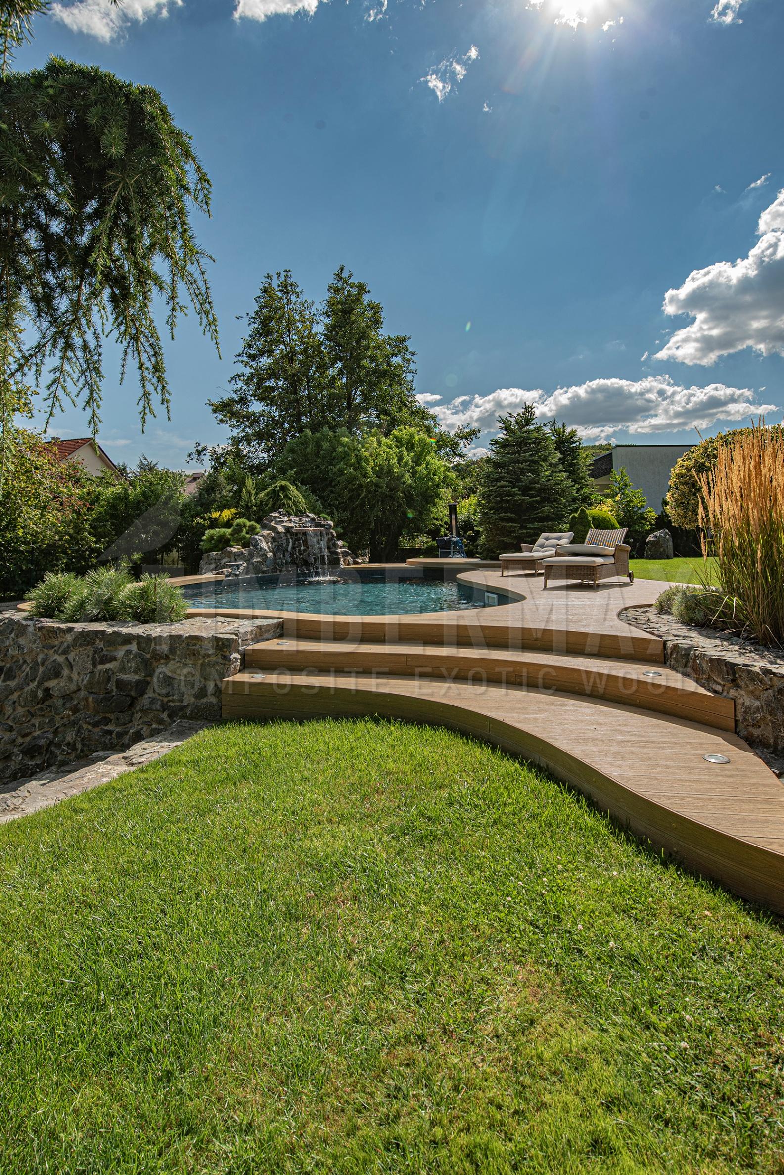 modern floor to the pool made of composite boards for the terrace