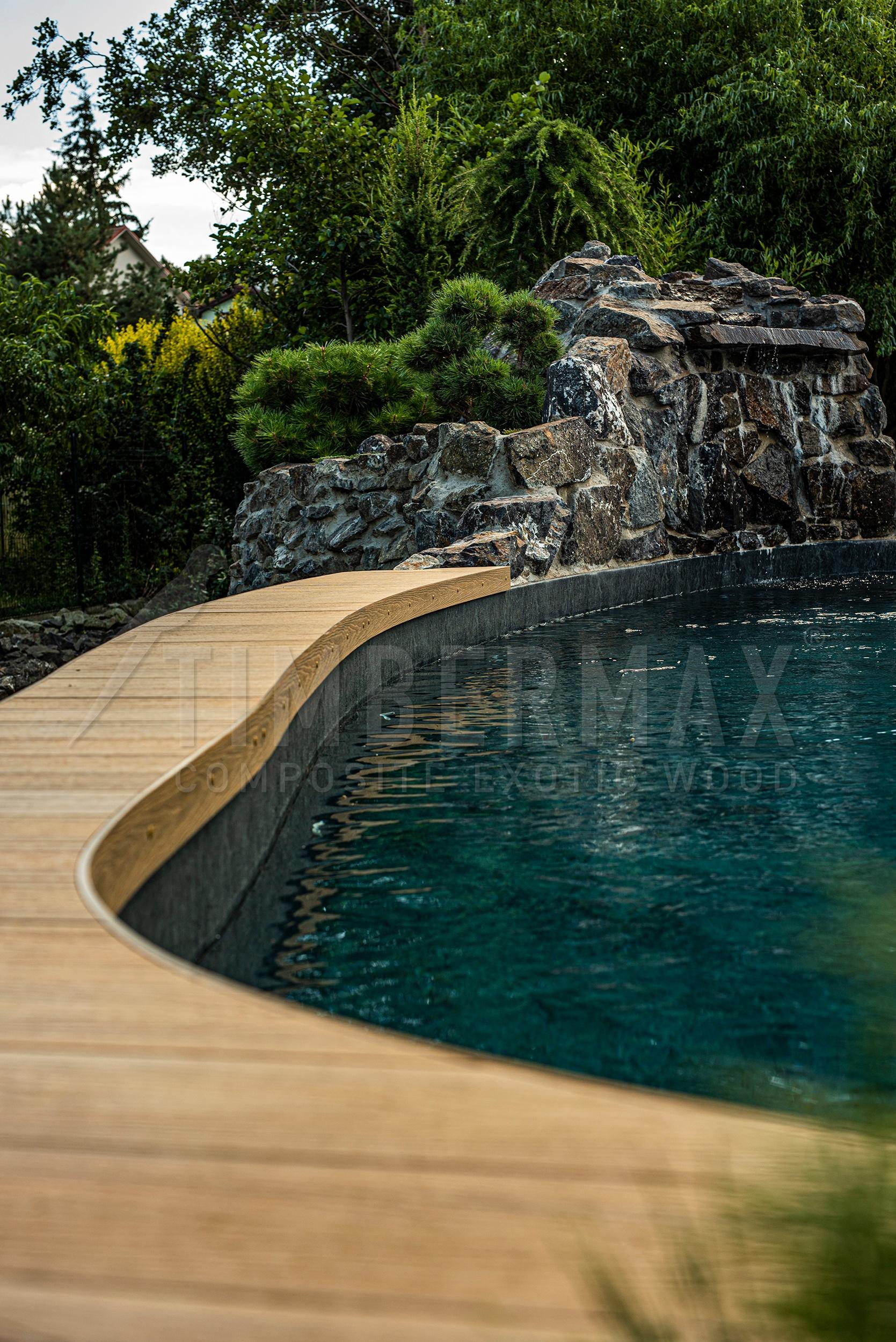 composite decking and pool decking in a modern garden