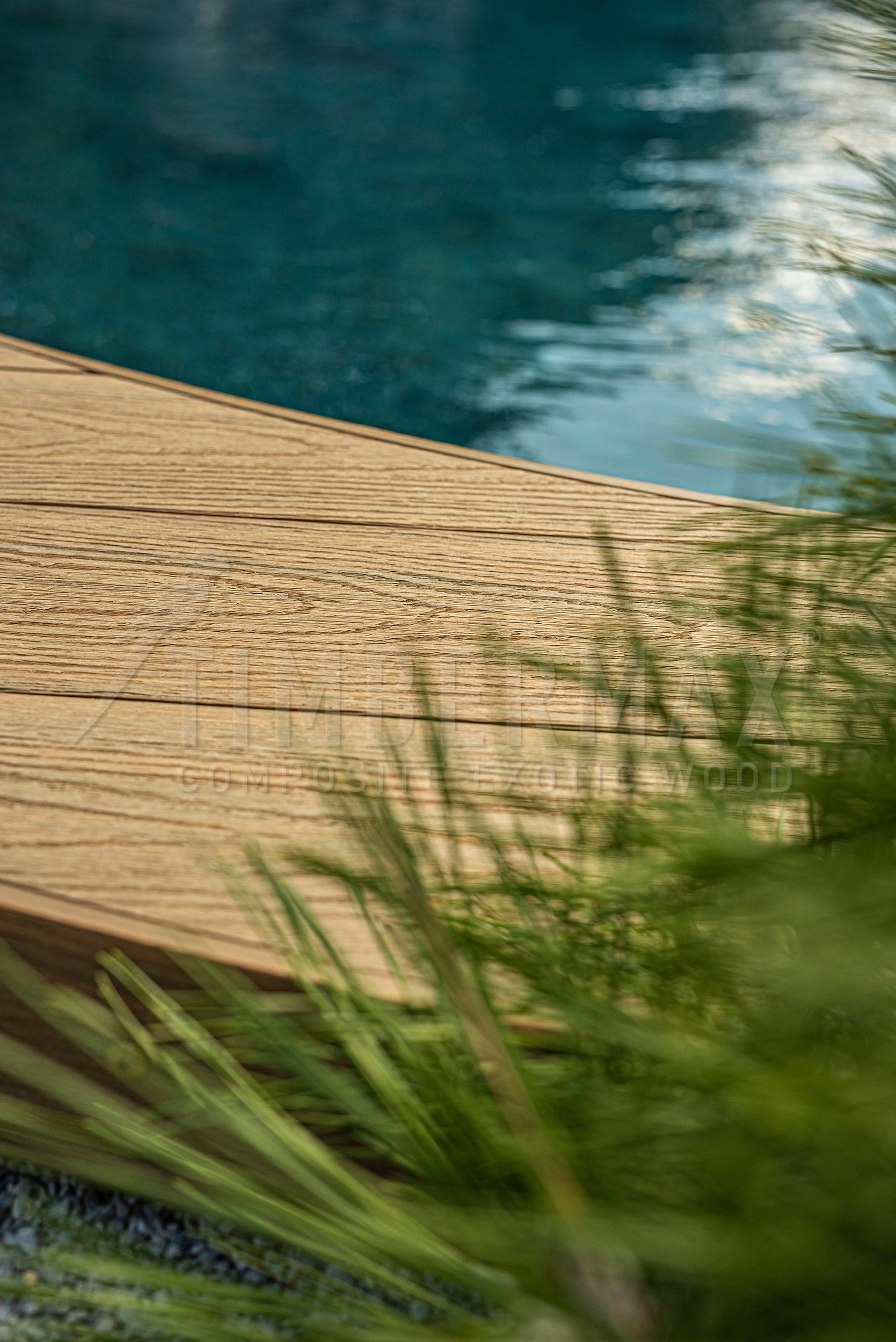 detail of wpc terrace flooring and composite decking boards by the pool