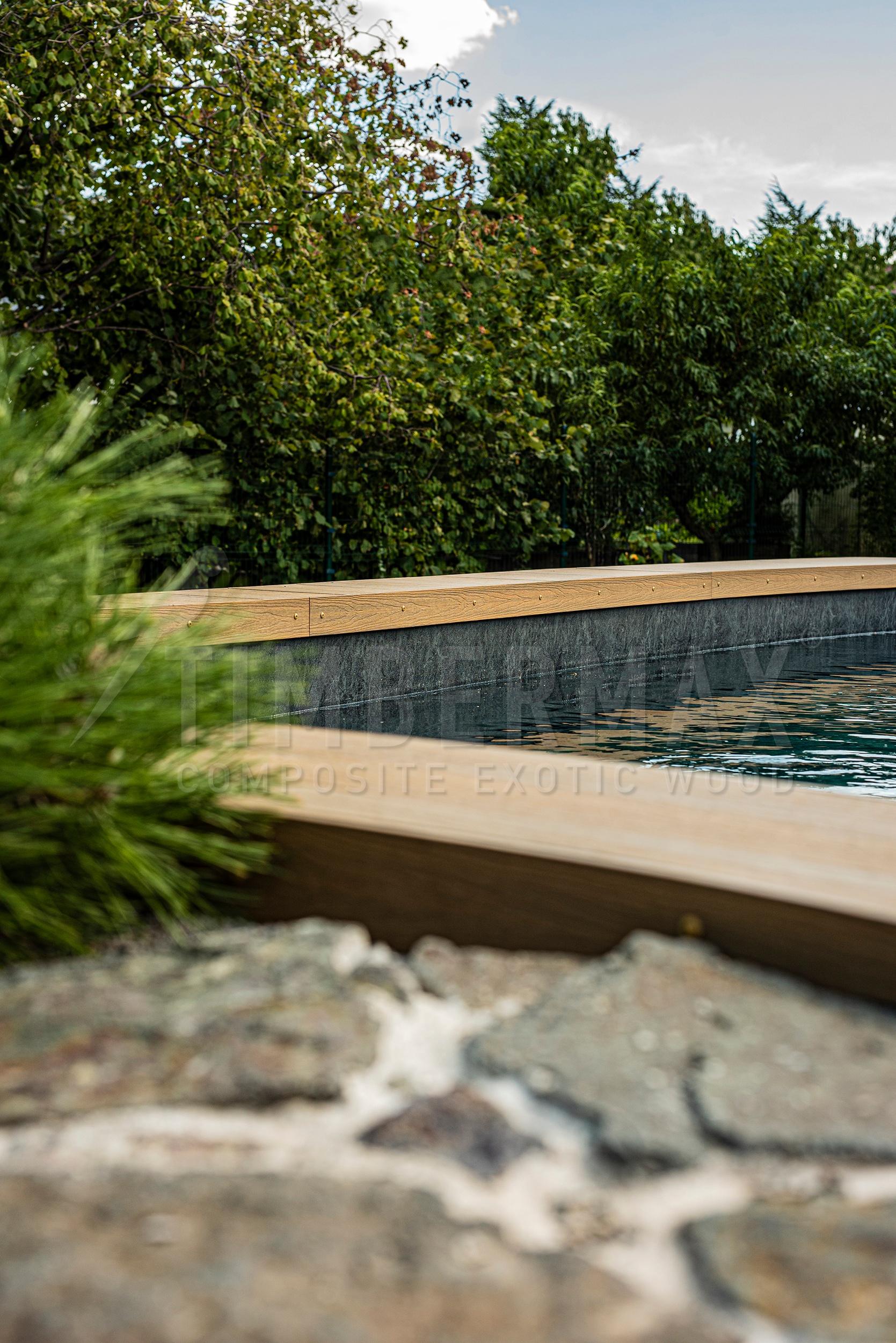 terrace boards made of composite as a floor for the pool on the garden terrace