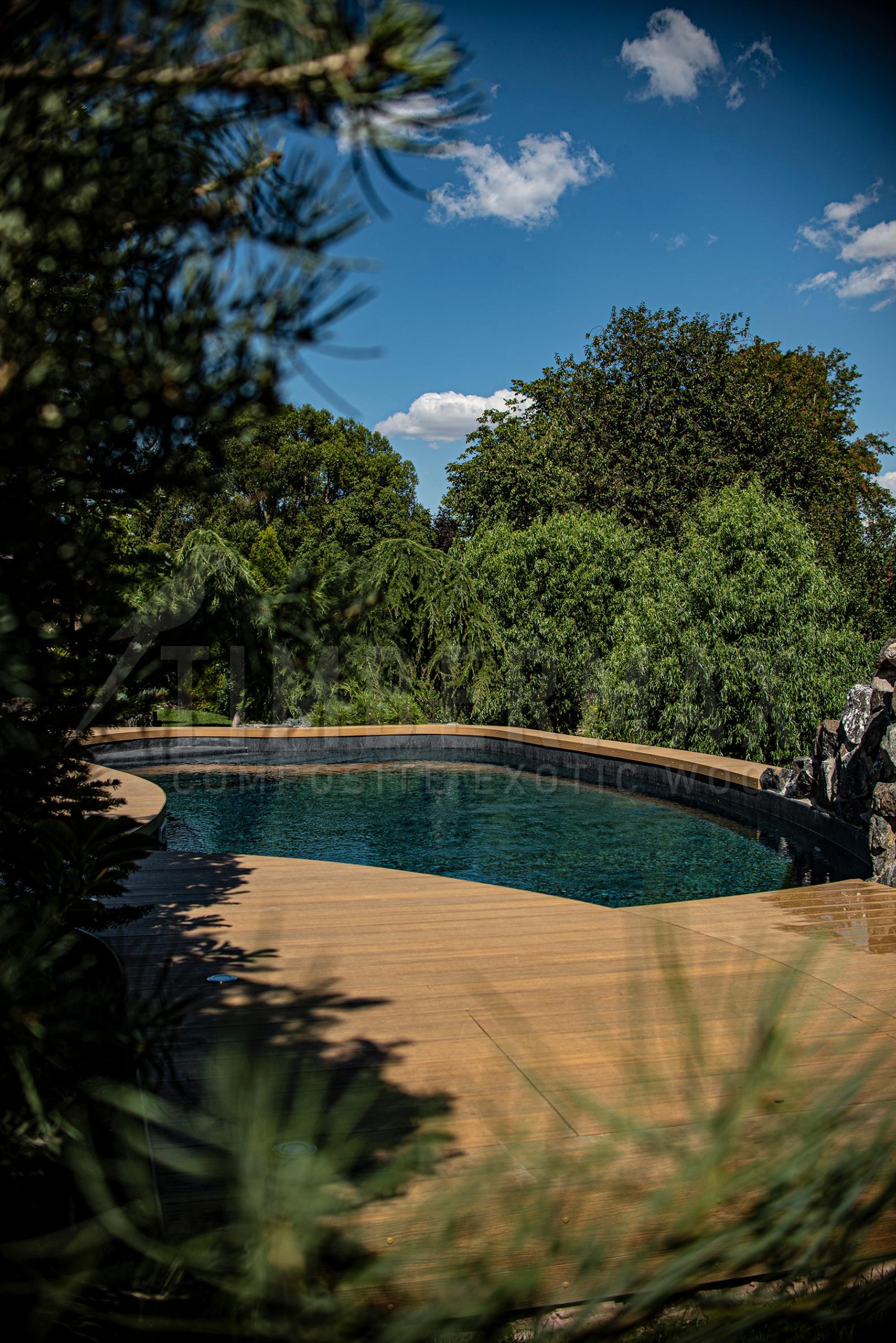 modern terrace with composite terrace boards as the floor to the pool