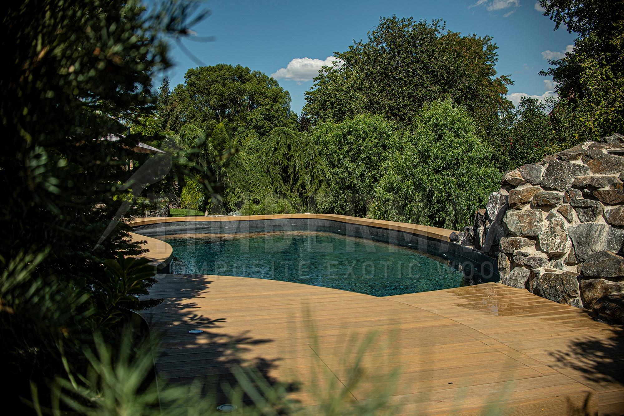 decking boards made of composite around the pool on the garden terrace
