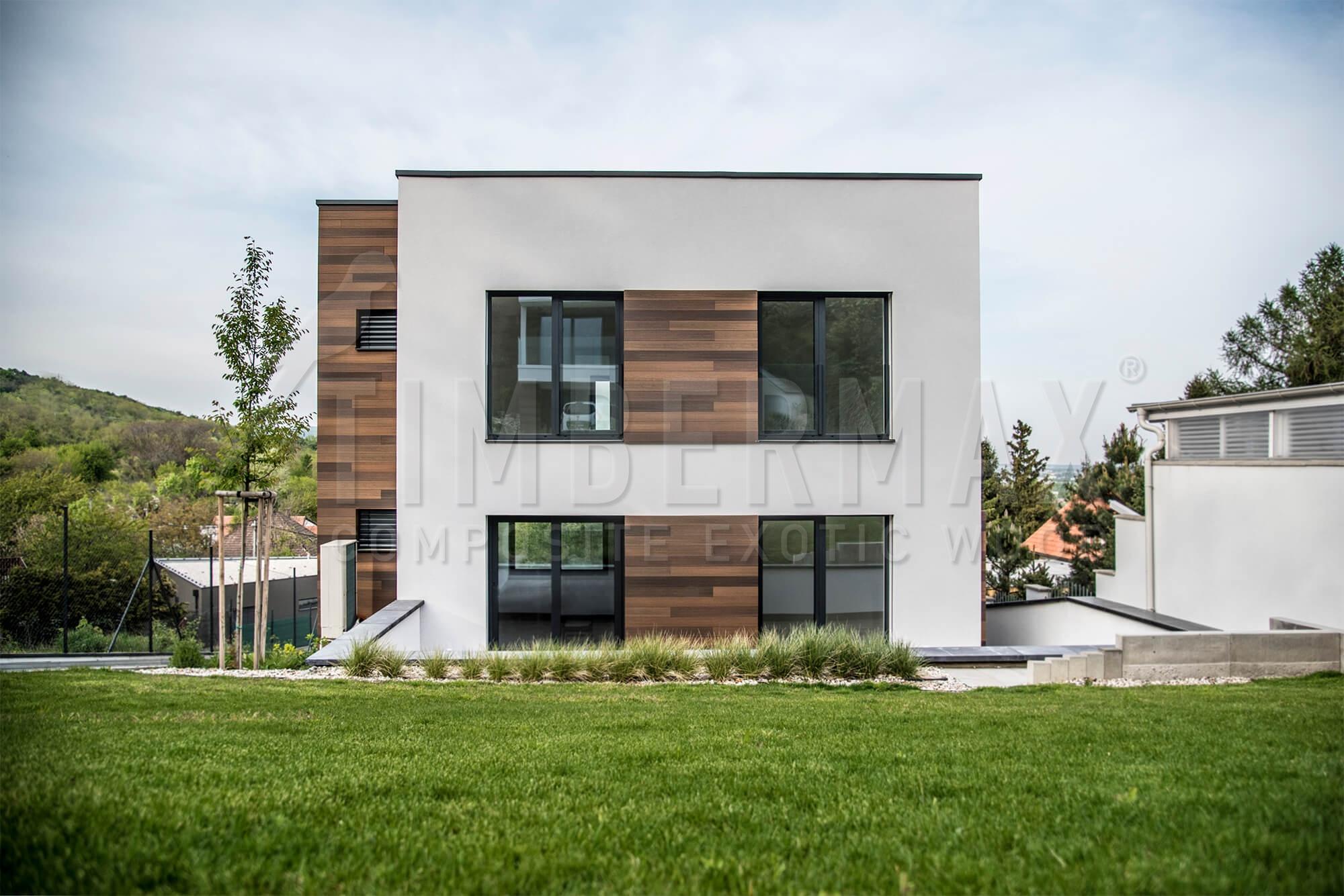 family house with large-scale facade cladding imitating wood