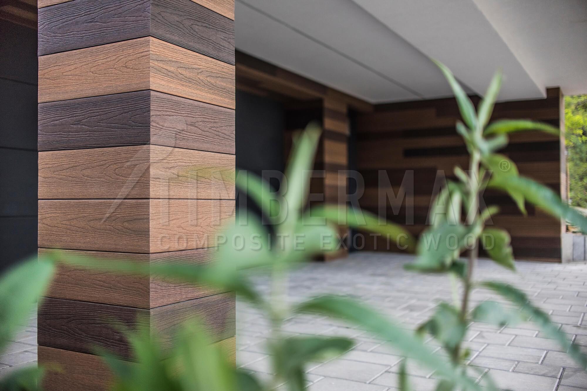 detail of the facade of the house made of light facade cladding natural wood look