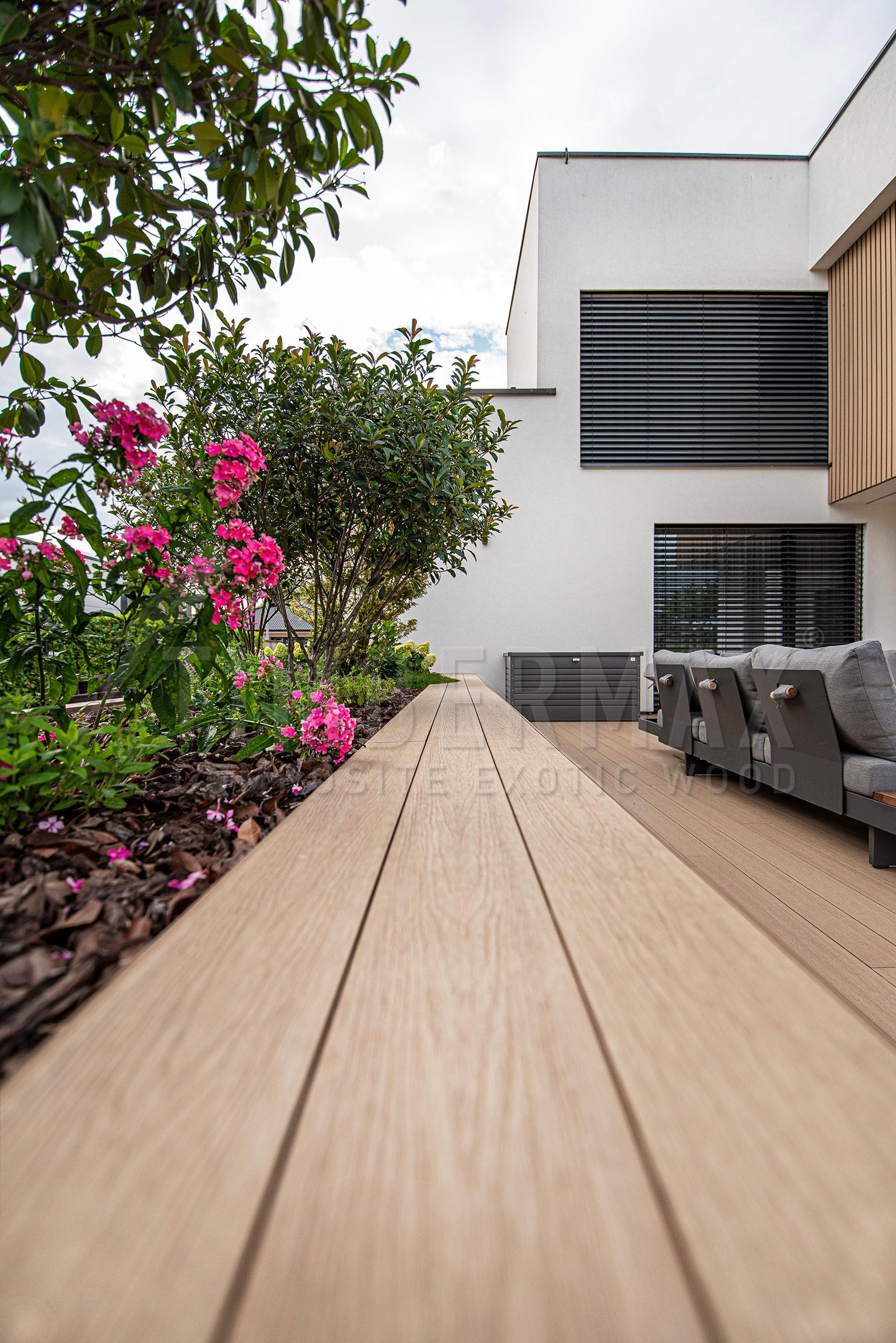 detail of composite decking boards on the patio in the garden