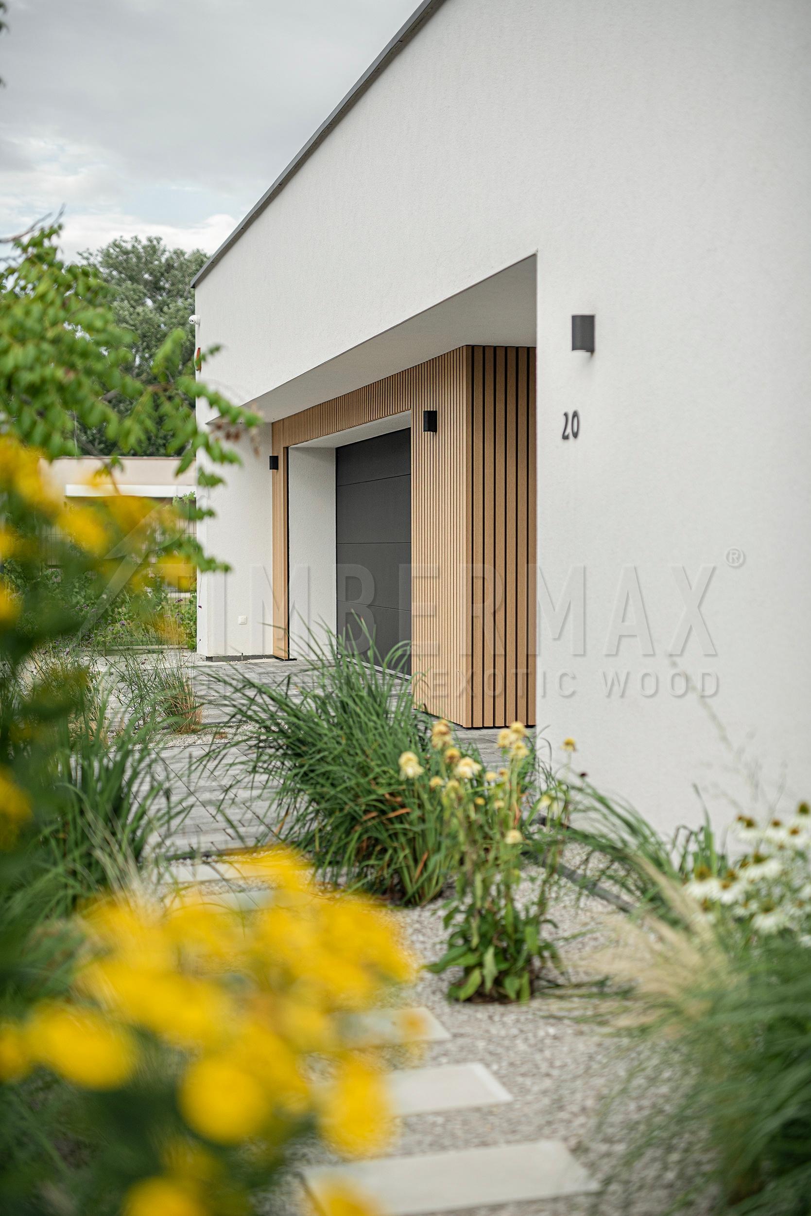 entrance to the house with vertical blinds made of composite boards