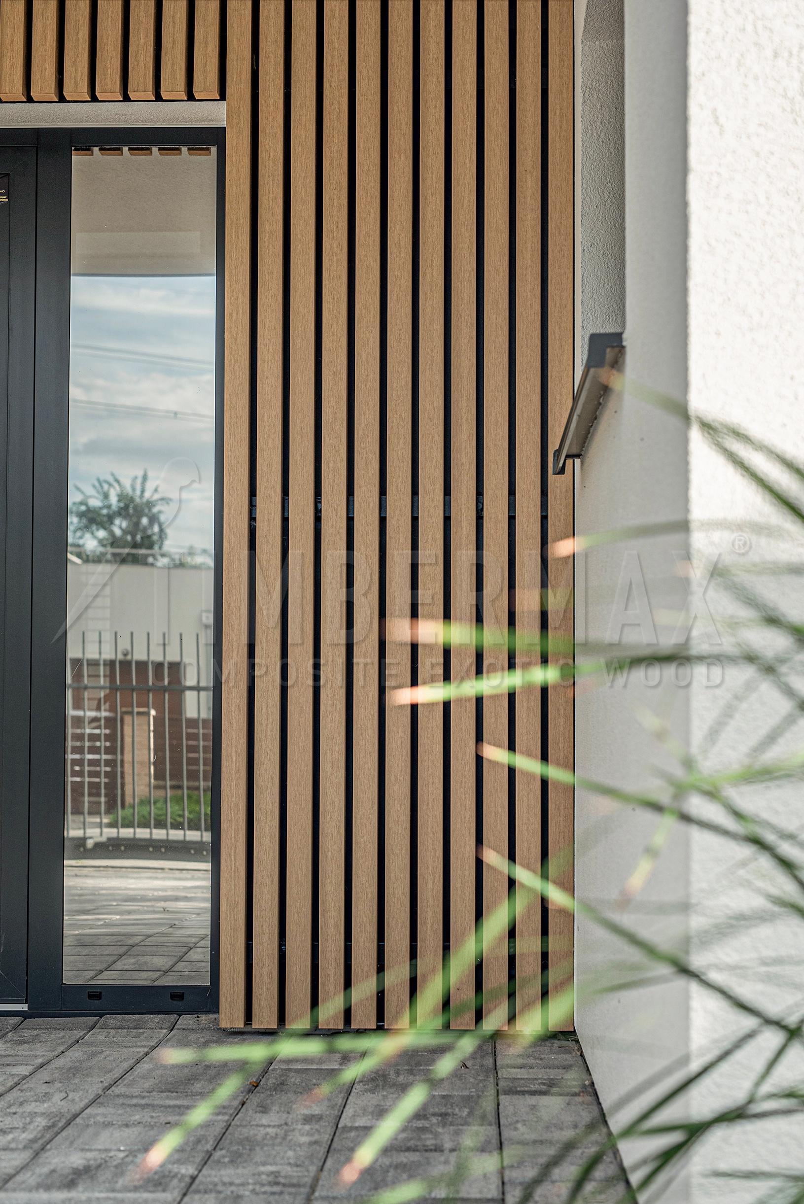 vertical facade sunshades made of composite boards at the entrance