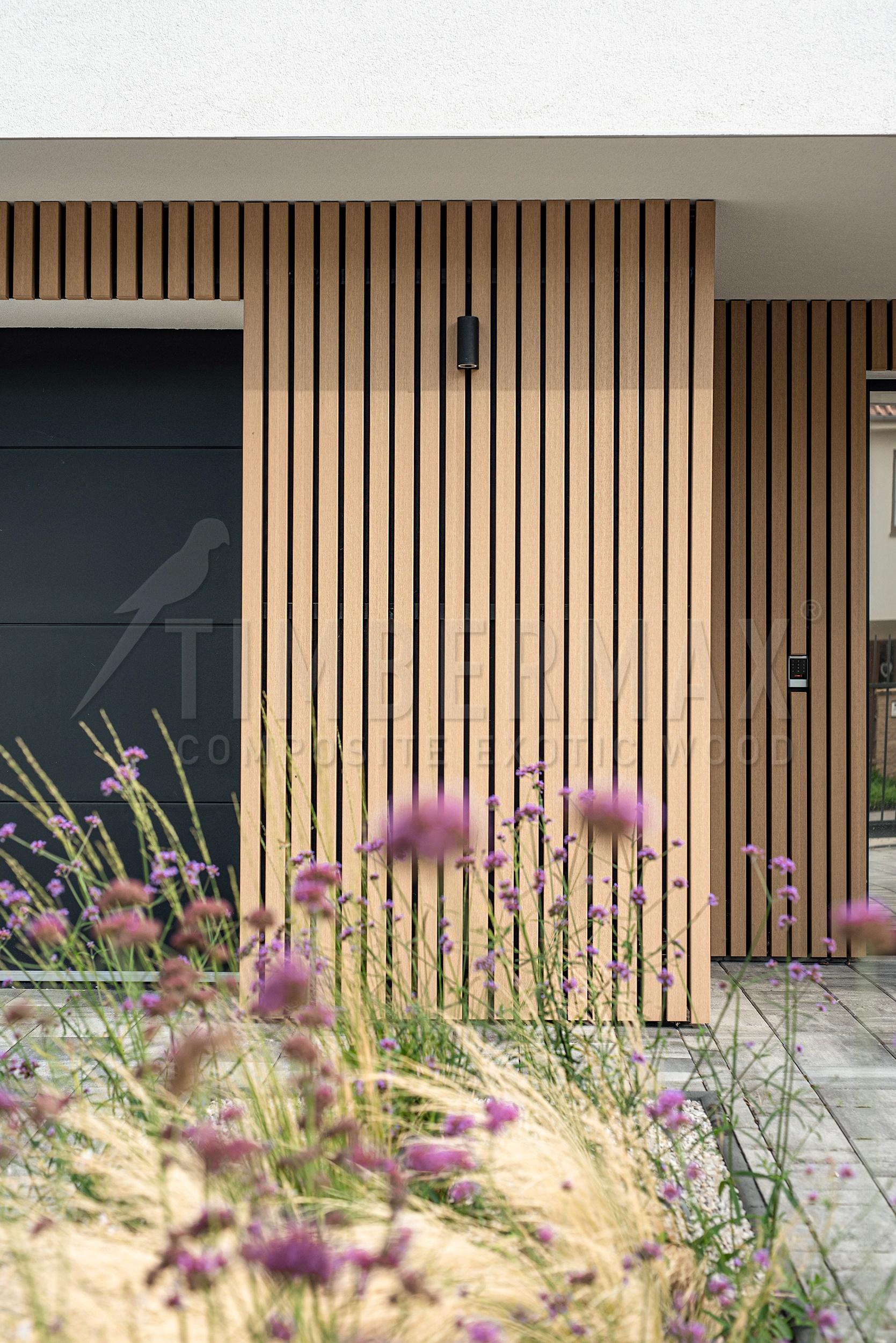 detail of the facade sunshades made of composite boards on the facade of the house