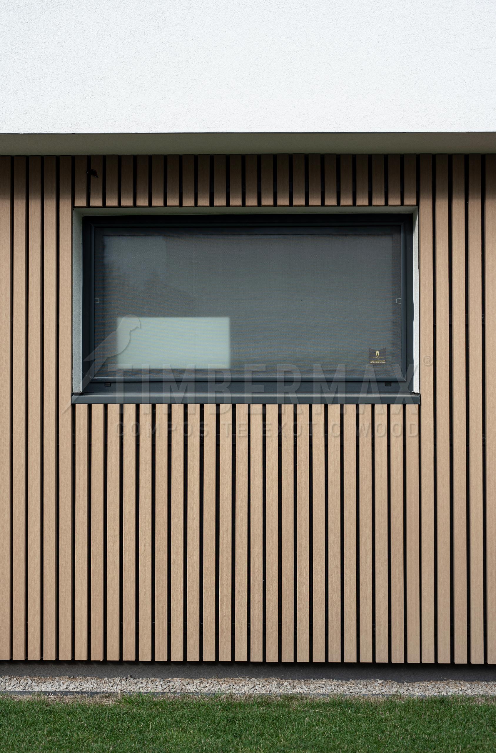 detail of the vertical slatted facade imitating wood