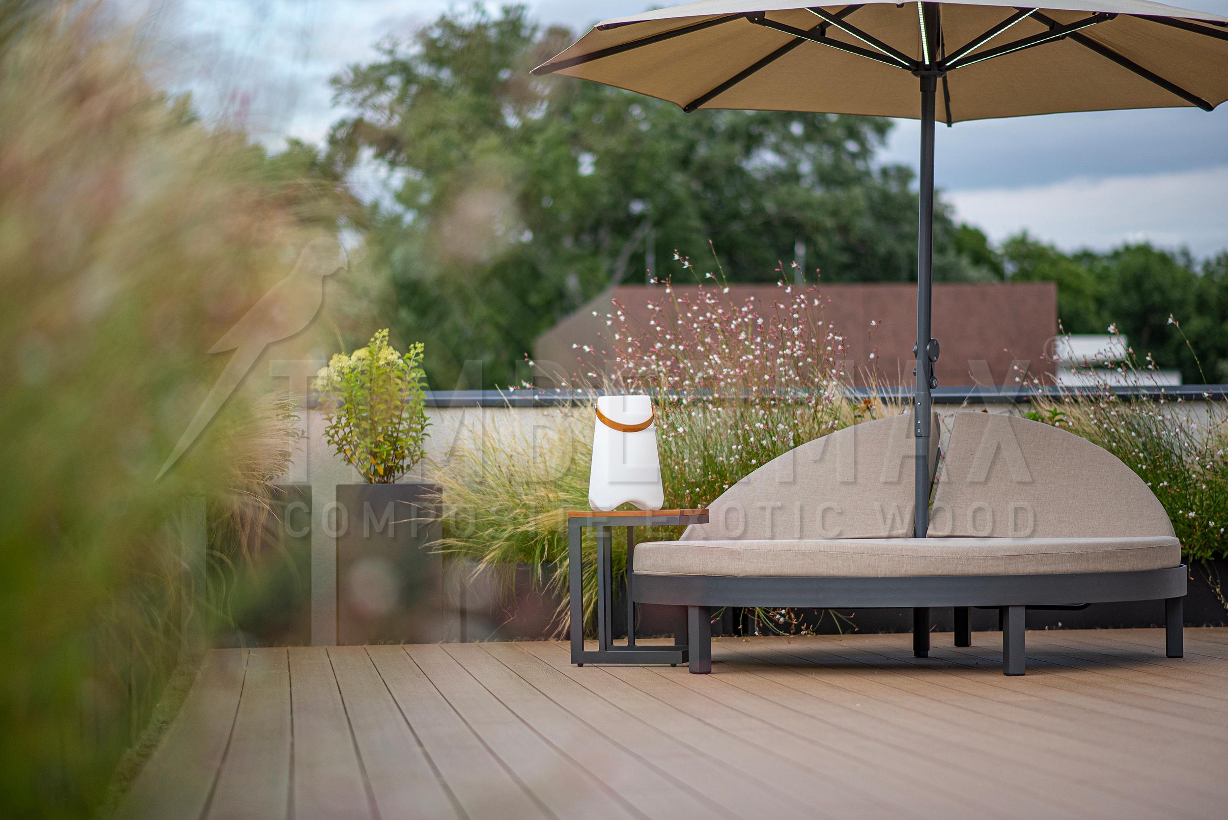 garden terrace with composite floor and deckchair