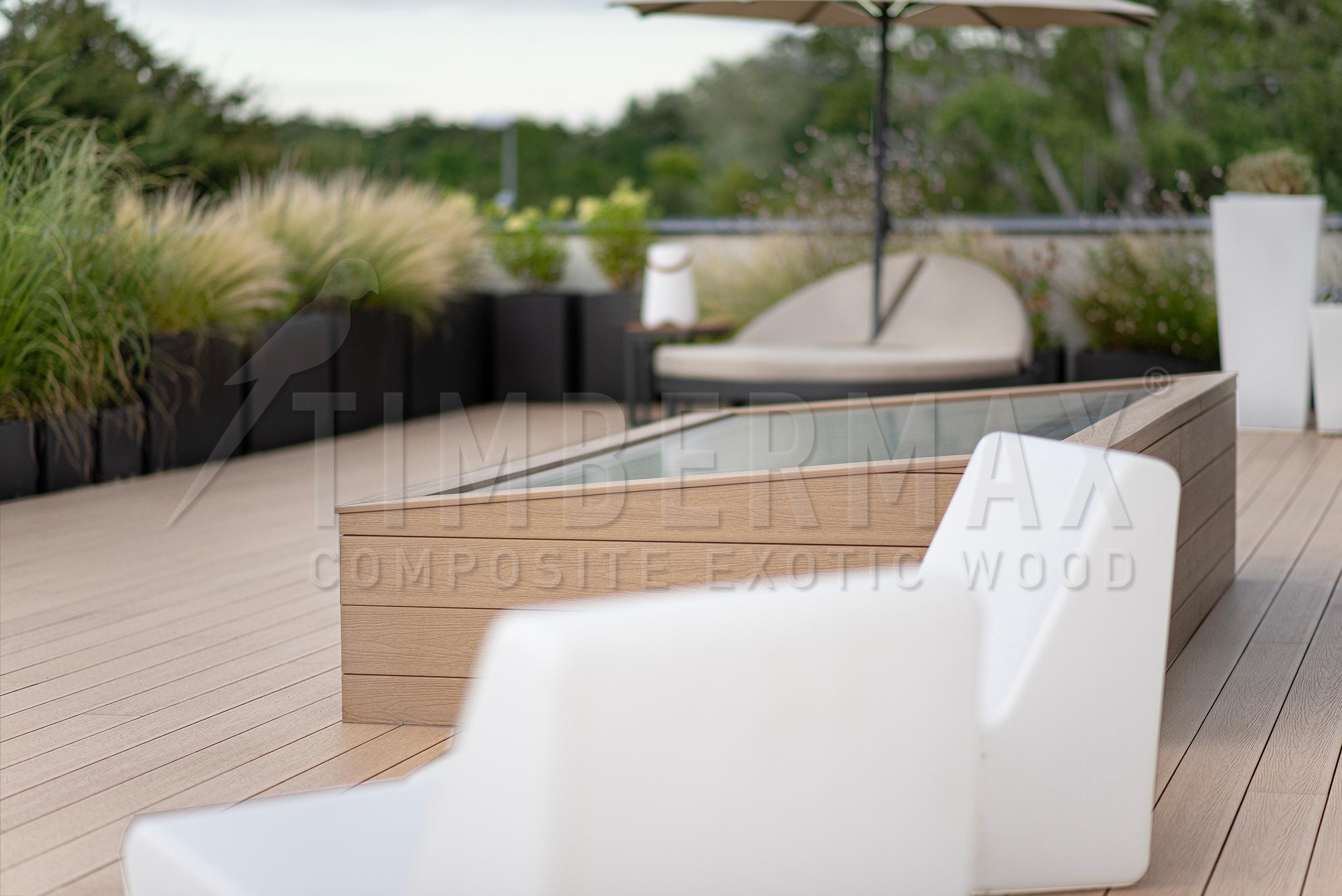 composite decking boards on modern roof deck with lounger