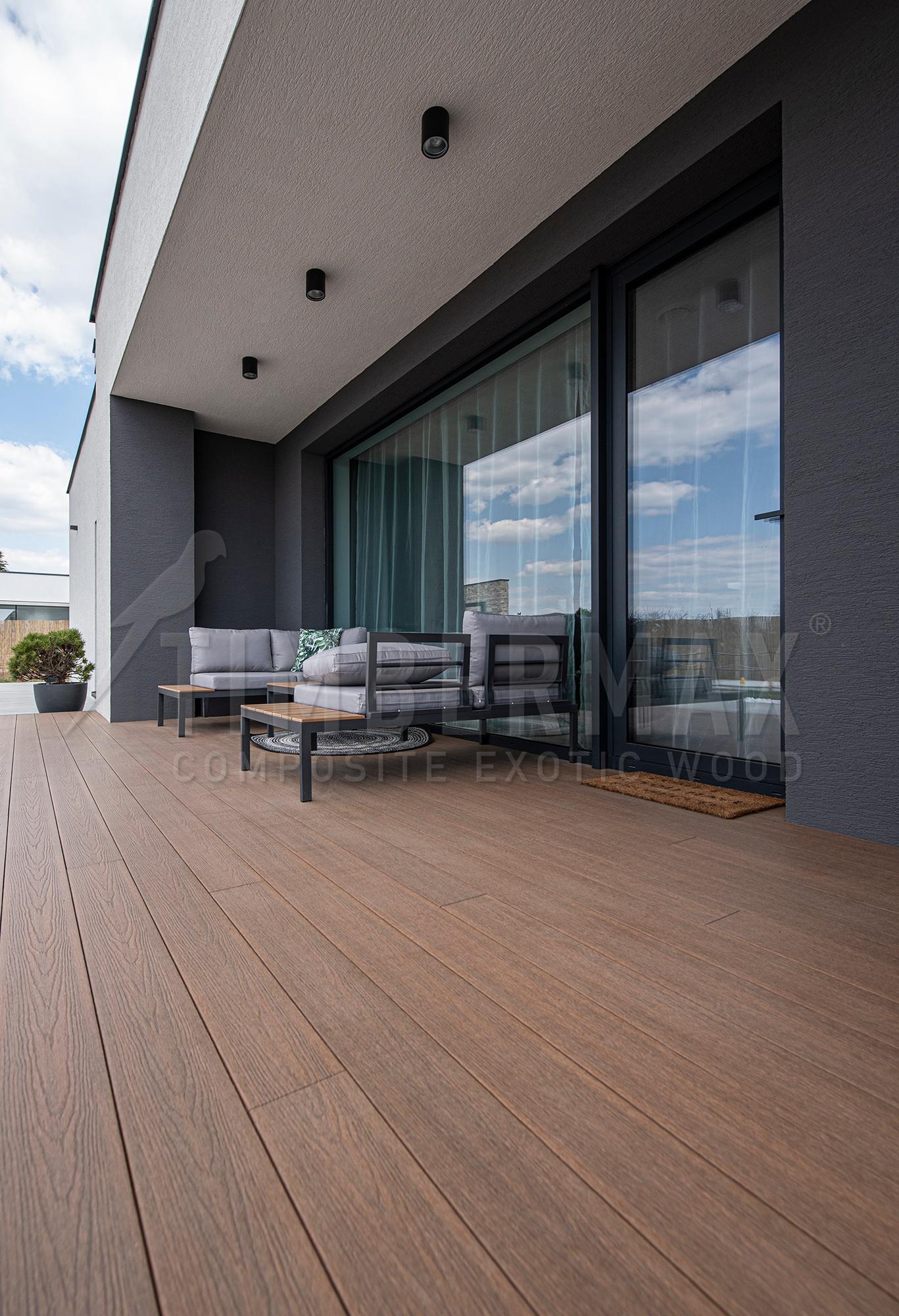wpc floor for the terrace near the large glass window of the family house