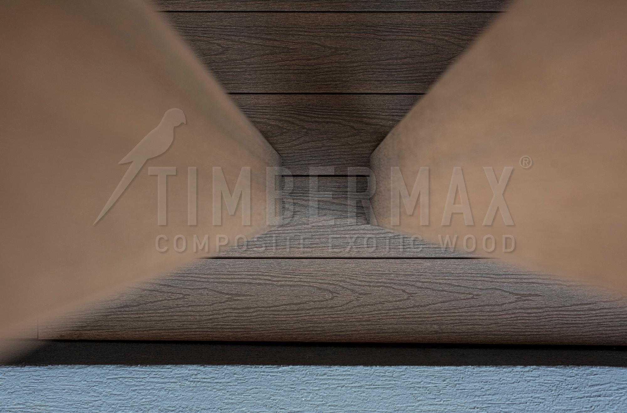 detail of the facade made of slats in dark wood decor, composite facade cladding