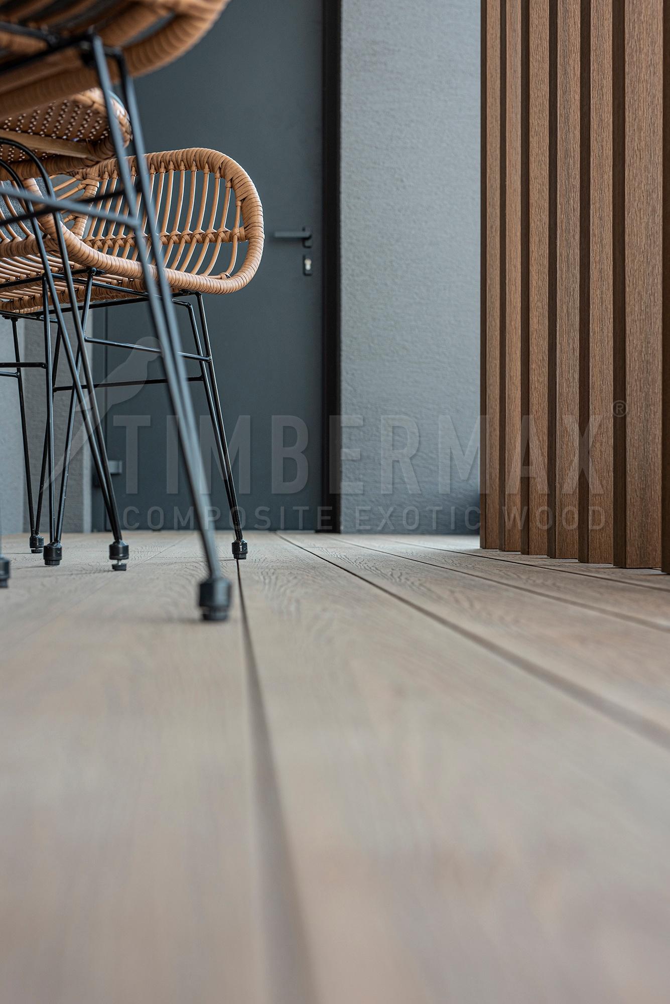 detail of wpc terrace boards with garden furniture
