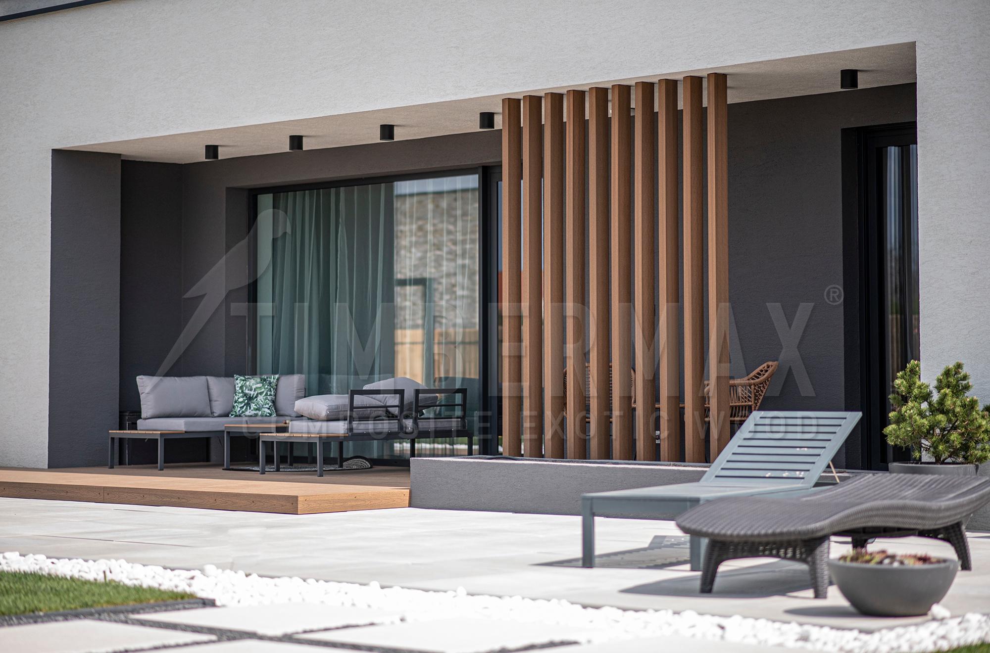 slatted facade and composite slats on a modern house facade cladding imitating wood
