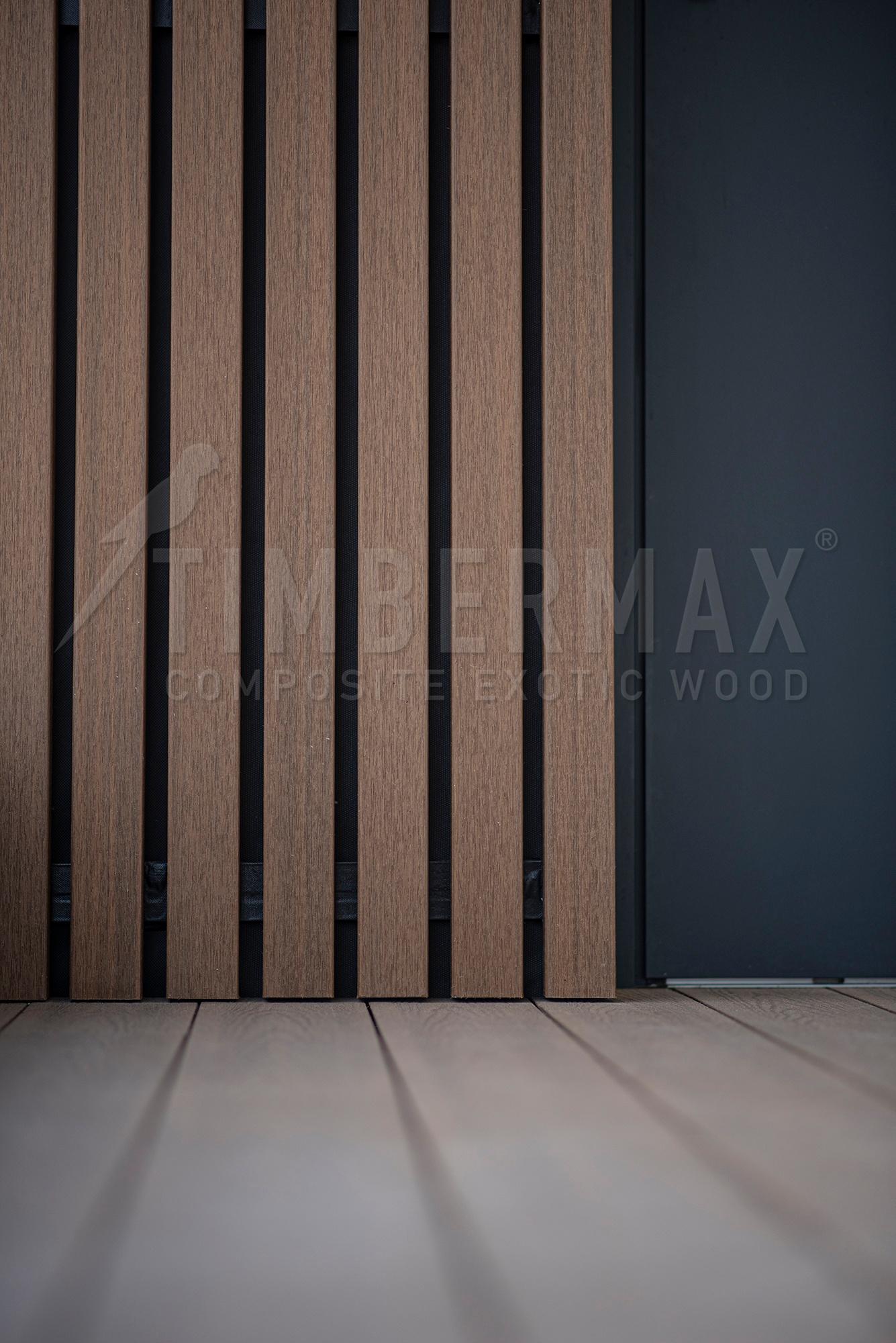 modern slats on the facade of the house, wood-plastic facade cladding
