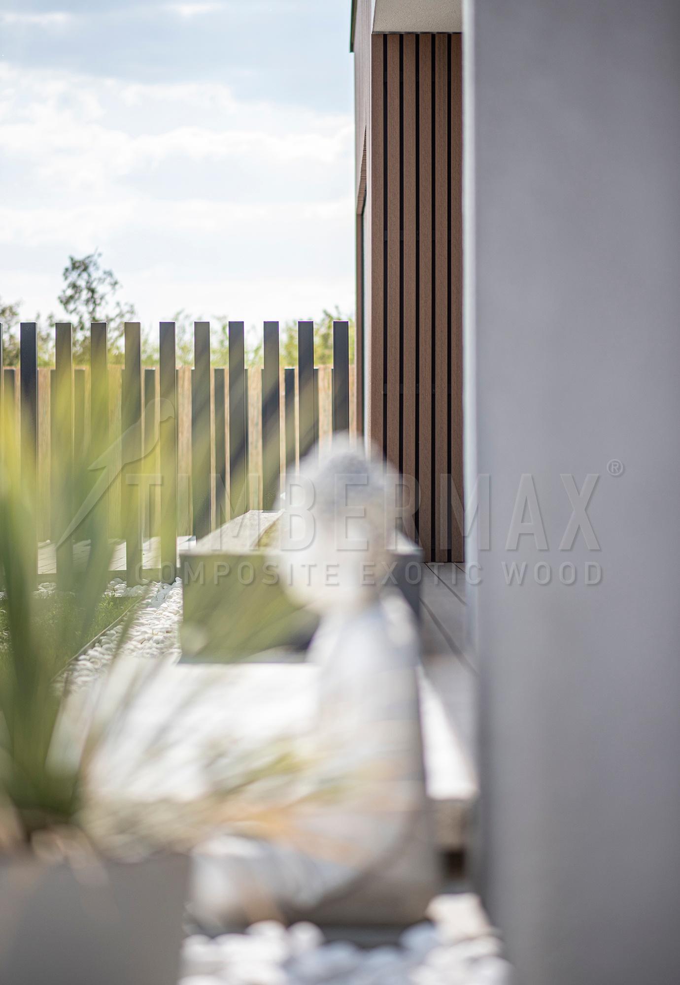 detail of wpc fence boards and slats on the facade of the house