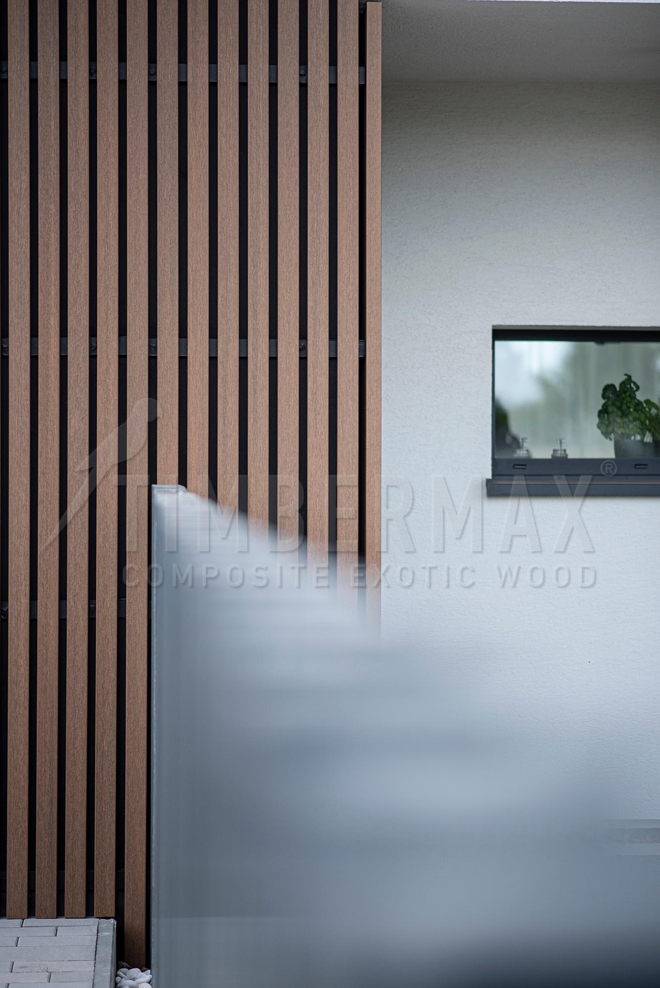 detail of the slatted facade in combination with sunshades